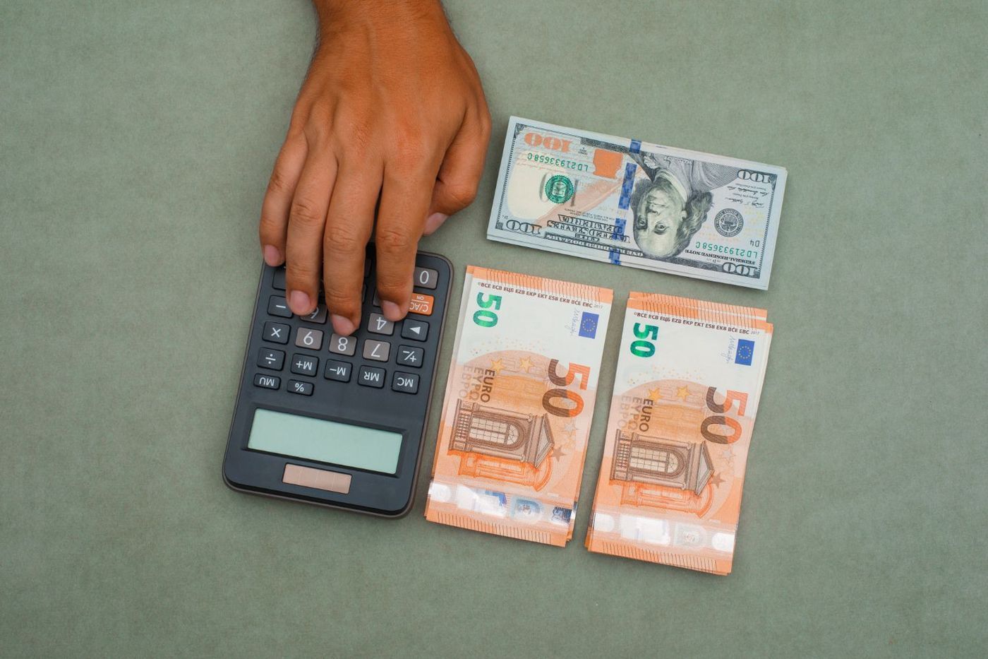 man using calculator